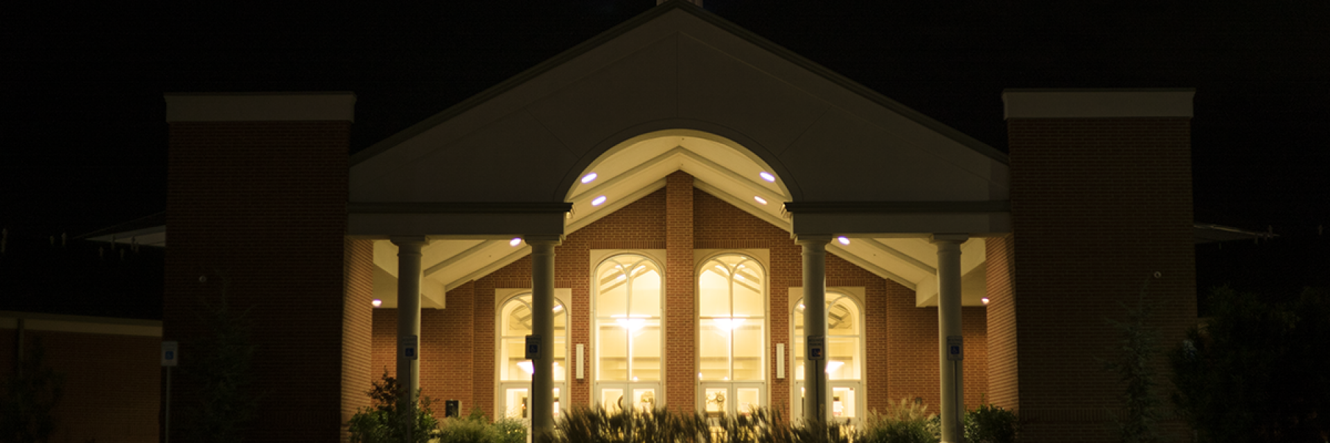 Front View of Church Building at Night